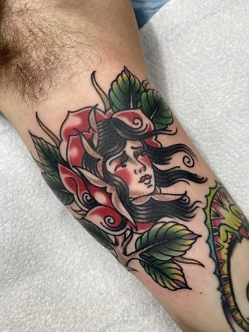 Lady head with red rose — traditional tattoo by Alex Roze, Kelowna