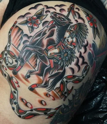 Cowgirl riding a horse with a second face and red flowers. Tattoo by Alex Roze.